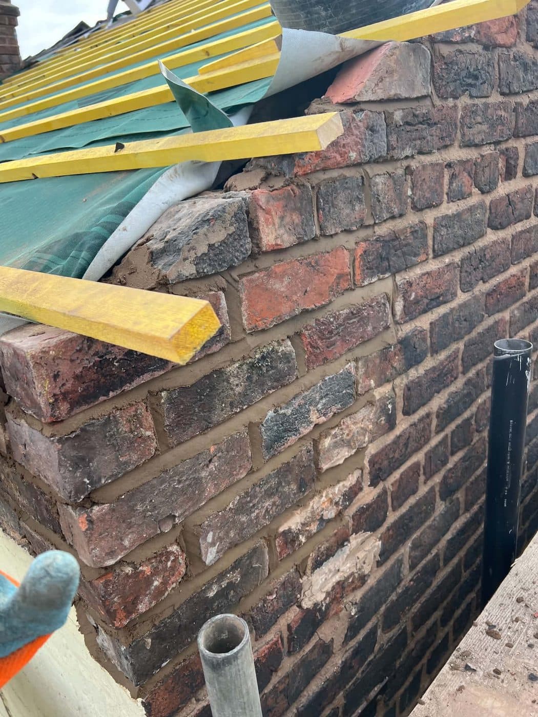 Rebuilt and repointed brick gable end apex, Birkenhead