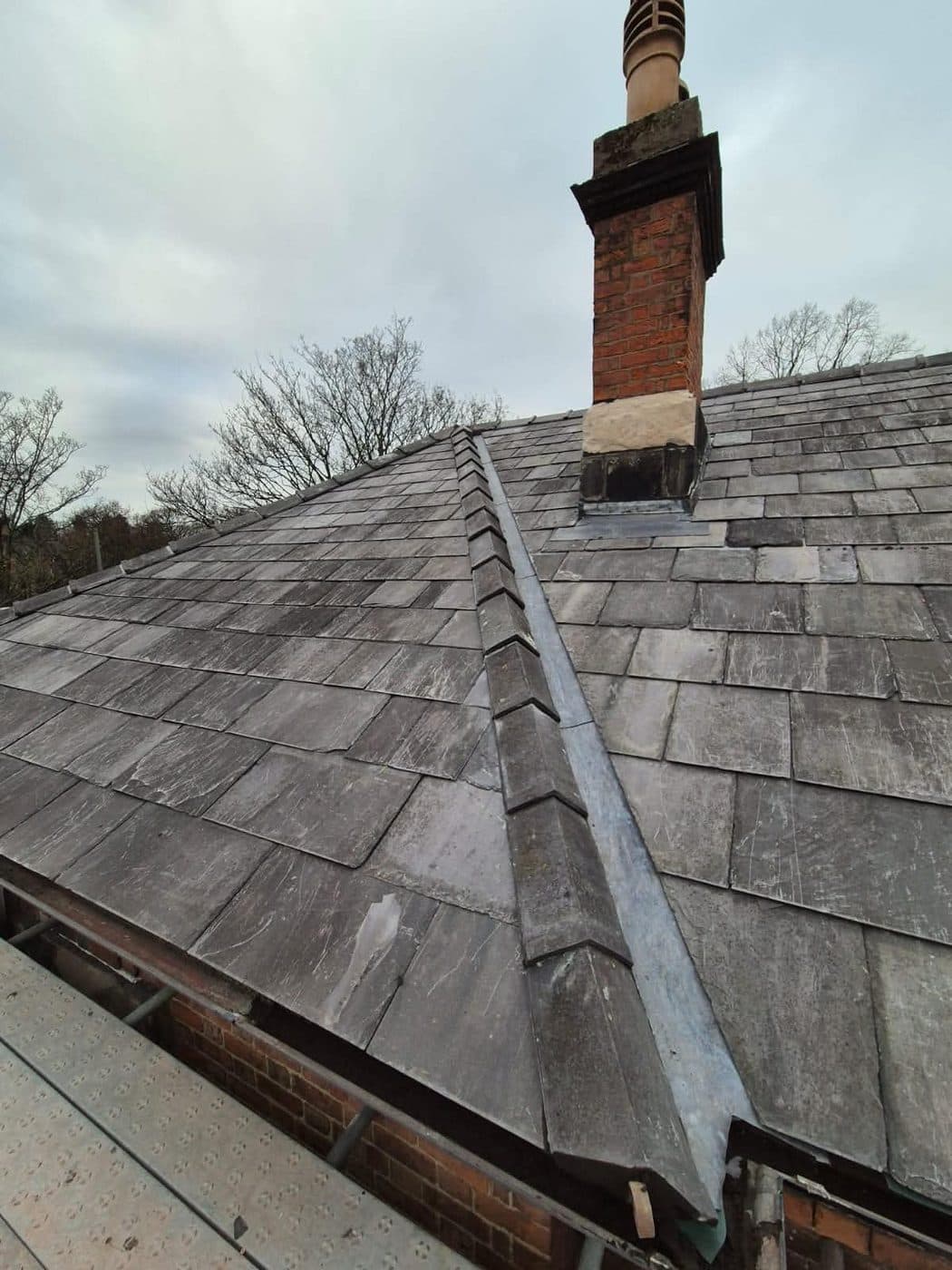 Releaded chimney stack on a slate roof, Oxton